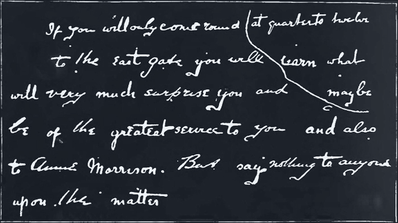 The reconstructed message assembled from two torn scraps of paper.